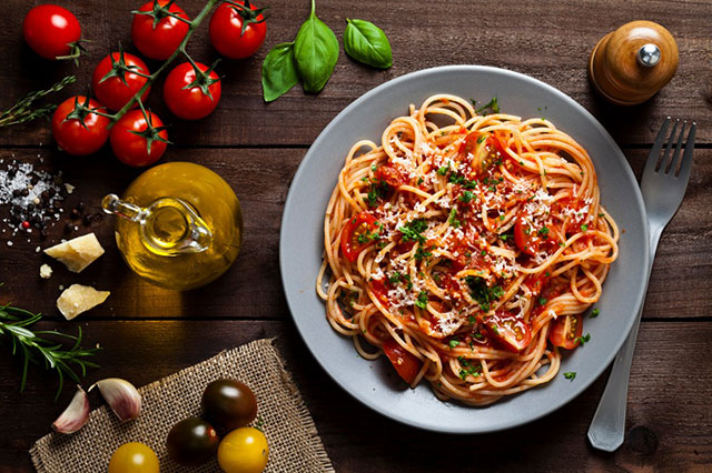 Spaghetti and typical Italian ingredients
