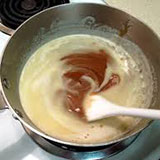 stirring a sauce